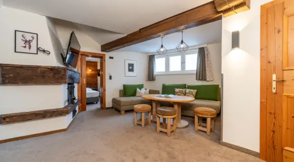 Familiensuite mit Seeblick in Zell am See ✓ 70 m² ✓ Kamin ✓ Kinderzimmer ✓ Bad mit Badewanne ✓ bis 7 Pers. ► Jetzt buchen!